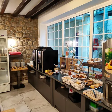 Logis Grand Pelisson Hotell